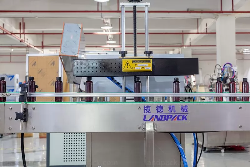 automatic bottle filling and capping machine