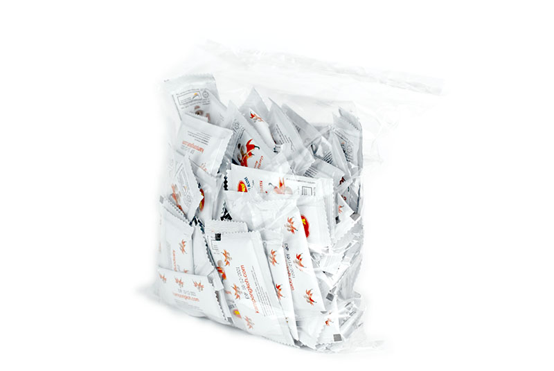 Packing Small Sauce Sachets Into Large Bag