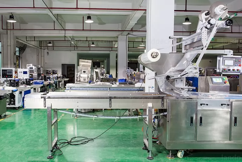 flow wrapper packaging machine