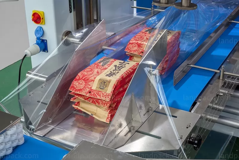 flow wrapper packaging machine