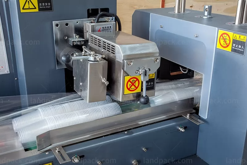 flow wrapper packaging machine