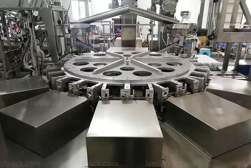 spout inserting sealing machine