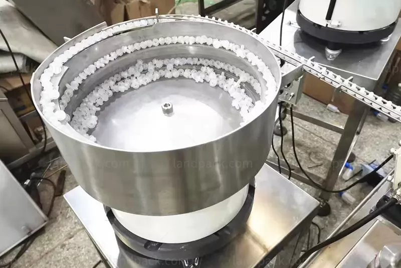 spout inserting machine spout inserting machine