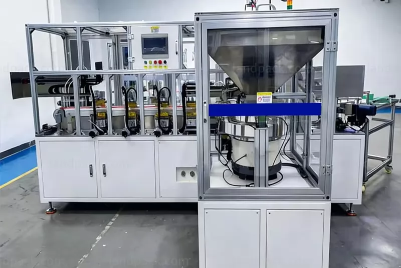 spout inserting machine spout inserting machine