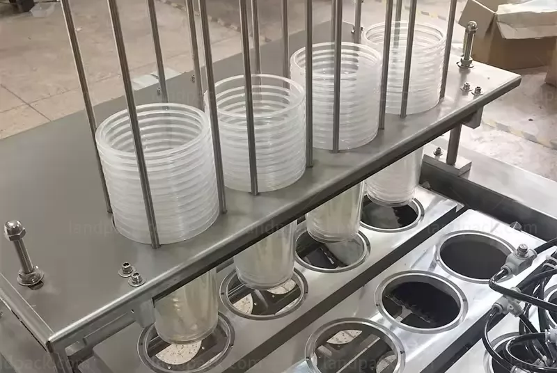 automatic cup filling and sealing machine automatic cup filling and sealing machine