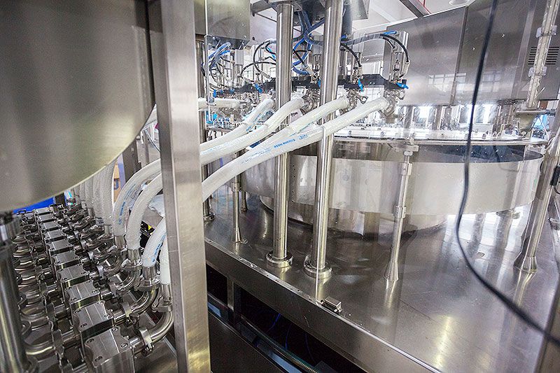 High Speed 10 Heads Liquid Spout Pouch Filling and Capping Machine